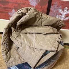 A bag full of men's clothes (shirts)の画像