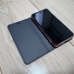 [美品] Rakuten Mini クリムゾンレッド 後期型 SIMフリー アンドロイドスマートフォン 新品専用手帳ケース付きの画像