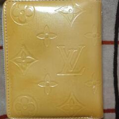 きいろ色の🟡ルイヴィトンのミニ財布　の画像