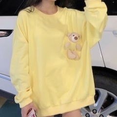 セーター マスコット付きの画像