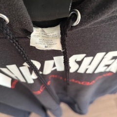 THRASHERフード付きパーカー　色褪せありの画像