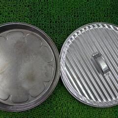 アウトドアテーブル と ピザ器の画像