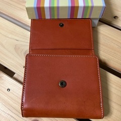 オレンジ色の財布❣️の画像