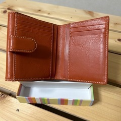 オレンジ色の財布❣️の画像