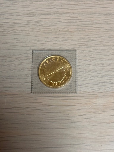 天皇御在位60年記念拾万円金貨