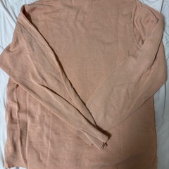ピンク　タートルネック　ニットの画像