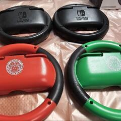 【取引中】ニンテンドースイッチ マリオカート用ハンドル4本の画像