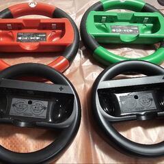 【取引中】ニンテンドースイッチ マリオカート用ハンドル4本の画像