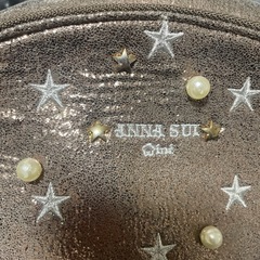 ANNA SUI 星型装飾 メタリックリュックの画像