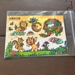 首里城のスタンプラリー記念品（シールと絵本）