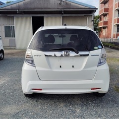 ホンダ フィットハイブリッド 　／ナビ　フルセグＴＶ　バックカメラ　Ｂｌｕｅｔｏｏｔｈ　ＤＶＤ再生ＯＫ　ＥＴＣ　の画像