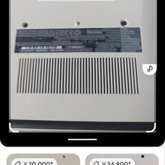 ノートパソコンとLANマウスと電源コードの画像