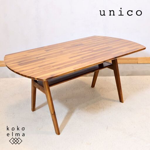 unico(ウニコ)のSWELLA(スウェラ)ダイニングテーブルW1400です！アカシア材を使用したラフな印象の食卓♪西海岸スタイルや男前インテリアにもおススメ。棚付きなので小物や雑誌の収納も可能！