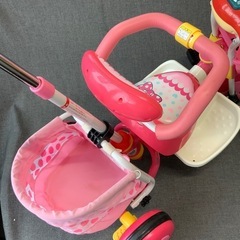 リユース　ディズニー　三輪車　ミニーマウス　おしゃべりカーゴ　1.5歳から5歳未満　身長目安　80から100cm  コントロールバーとハンドルの連動可能　ピンク色の画像