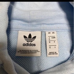 adidas パーカー クロップド ショートの画像