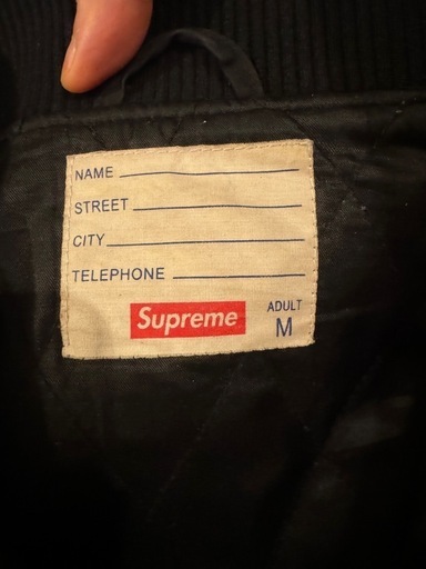 超美SUPREME Motion LogoVarsityスタジャン黒レザー赤ロゴ