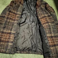 チェックのコートの画像