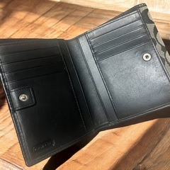 coach ダブルホック 財布の画像