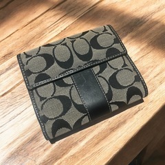 coach ダブルホック 財布の画像
