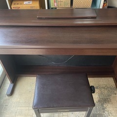 電子ピアノ　ブラウンの画像