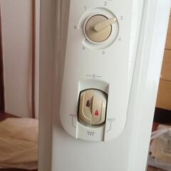 デロンギオイルヒーター　カバー付きの画像