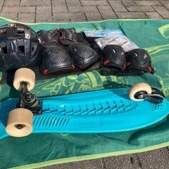 スケボーと防具の画像