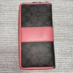 COACH 長財布 黒とピンク モノグラムの画像