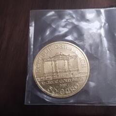 田中貴金属　24k  ウィーン金貨ハーモニー　メイプルリーフ金貨　1／2オンスの画像