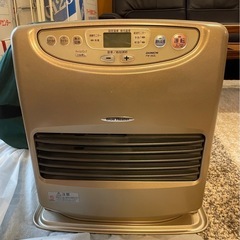 石油ファンヒーター　扇風機の画像