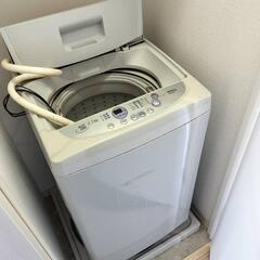 冷蔵庫と洗濯機と電子レンジの画像