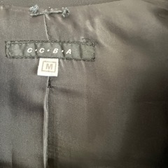 黒　レディース　パンツスーツの画像