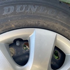 スタッドレスタイヤ 205 65 15 DUNLOP DSX-2 冬タイヤ とりあえずのタイヤに トヨタ ホイールカバー  ４本セット  の画像