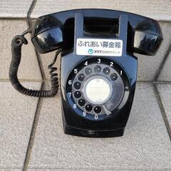 黒い電話機　 貯金箱の画像