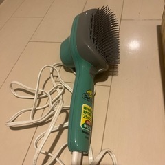 ペット吸毛ブラシ　
ナショナルの画像