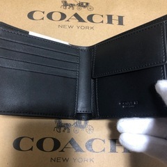 coach 二つ折り財布の画像