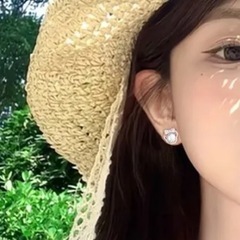 可愛いリボンパールピアスの画像