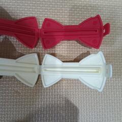 食品とか留めるやつ　赤白の画像