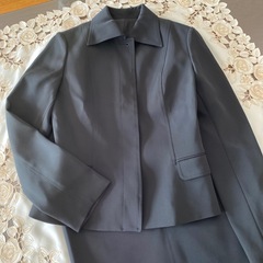 ブラック　スーツの画像