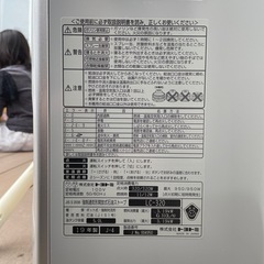 石油ファンヒーターとポリタンクの画像