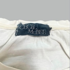 セシルマクビー❤Tシャツ　レディース　半袖シャツ　Mサイズ　ロゴ総柄の画像
