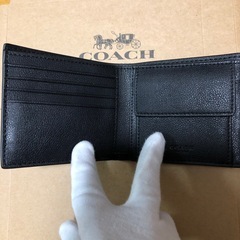 coach 二つ折り　財布の画像