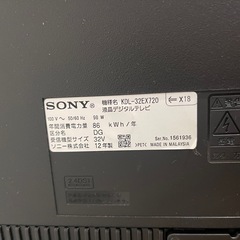 液晶テレビとテレビ台と地デジチューナーの画像