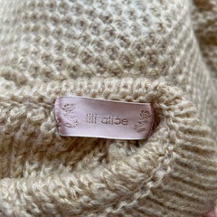 ニット生地のポンチョの画像