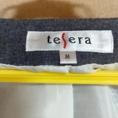 ブルーグレーのジャケットの画像