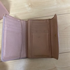 MIU MIUの三つ折り財布の画像