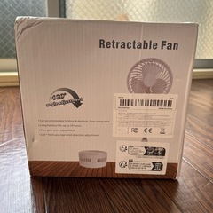 未開封の炊飯器、未使用のミニ扇風機の画像