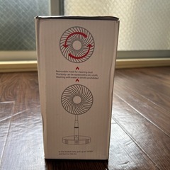 未開封の炊飯器、未使用のミニ扇風機の画像