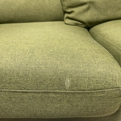 おしゃれな緑色ソファーの画像