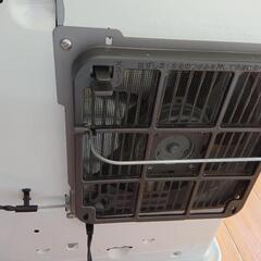 石油ファンヒーター（ポリタンクとポンプ付き）の画像