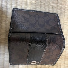 coach 二つ折り財布の画像